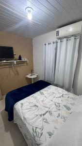 Voodi või voodid majutusasutuse Flat sol de Noronha toas