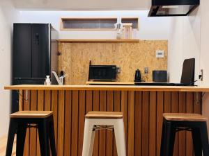 Kuchyň nebo kuchyňský kout v ubytování ゲストハウスSLOW HOUSE okuizumo