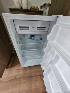 Kuchyň nebo kuchyňský kout v ubytování Wood One - Apto com varanda e Fácil acesso ao Metrô e Expo Imigrantes