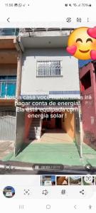 a sign on the side of a building at Suite confortável prox a COP 30 in Belém