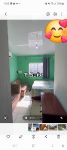 a picture of a bedroom with a face on the wall at Suite confortável prox a COP 30 in Belém