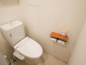 a bathroom with a white toilet in a room at REVISION Kairouyama-tei - Vacation STAY 15802 in Hiroshima