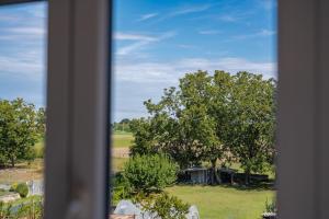 a view of a house from a window at RUBIERA Residence House 