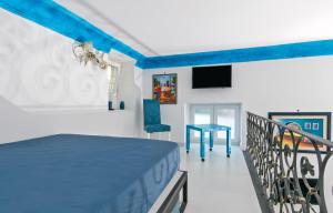 Posteľ alebo postele v izbe v ubytovaní Capri Dreaming