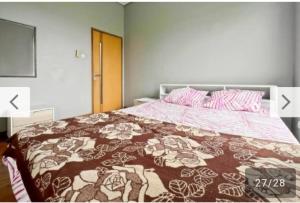 Ένα ή περισσότερα κρεβάτια σε δωμάτιο στο Newly Large Villa 3BR Dago Bandung by 2ndHome