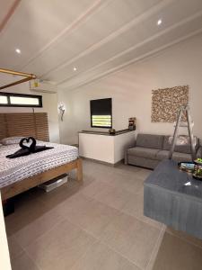 TV/trung tâm giải trí tại Boho garden Apt B