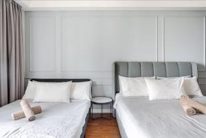 Ένα ή περισσότερα κρεβάτια σε δωμάτιο στο Luxury Living Hostel