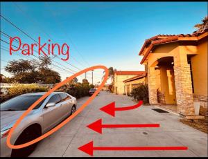 a car parked in front of a house with arrows at Rowland Heights in Rowland Heights