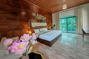 Ένα ή περισσότερα κρεβάτια σε δωμάτιο στο Peaceful Eco Haven Trang An