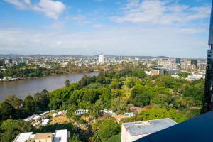 a view of a river and a city at Lvl30 Garden/River views Balcony by Stylish Stays in Brisbane +30 photos