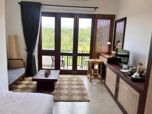 Ένα ή περισσότερα κρεβάτια σε δωμάτιο στο Kandy Opulent Home Stay