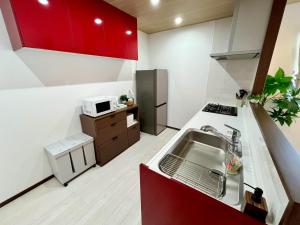 Η κουζίνα ή μικρή κουζίνα στο Value Residence Hotel 久貝