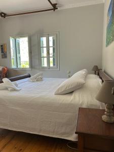 Ένα ή περισσότερα κρεβάτια σε δωμάτιο στο Villa To Petrino