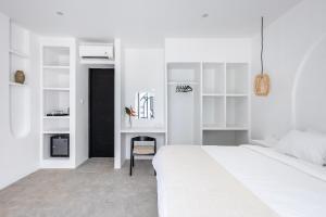 Postel nebo postele na pokoji v ubytování Boujee Boutique Hotel + 25 fotografií