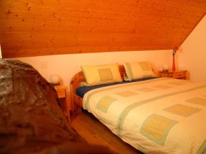 Postel nebo postele na pokoji v ubytování Garni Rosa Delle Alpi