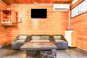 TV i/ili multimedijalni sistem u objektu Super Townhouse Morjim