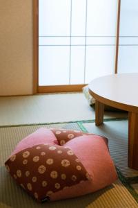 Ένα ή περισσότερα κρεβάτια σε δωμάτιο στο Sakuragawa-an Higashiyama