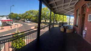 a balcony of a building with a view of a street at Premier Hotel Collie in Collie