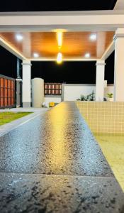 a view of a house with a driveway at lalinkan poolvilla 