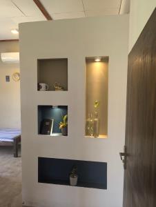 Postel nebo postele na pokoji v ubytování Aiden Homestay