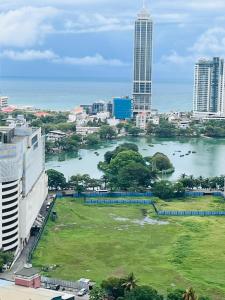 a view of a city with a river and buildings at Colombo, Trizen Luxury Apartments, Sri Lanka in Colombo