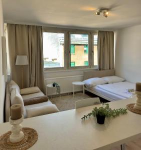 Postel nebo postele na pokoji v ubytování Brand new studio in Vienna + 8 fotografií