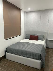 Postel nebo postele na pokoji v ubytování Hoàng Huy Hotel + 31 fotografií