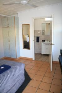 Kuchyň nebo kuchyňský kout v ubytování Central Motel Gin Gin