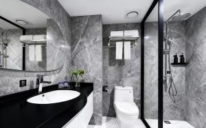 Koupelna v ubytování Miao Hotel