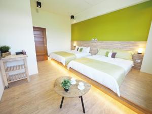 Postel nebo postele na pokoji v ubytování Season 5 Country Inn