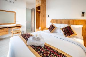 Postel nebo postele na pokoji v ubytování Mandala Hill Private Pool Villa Estate, Nusa Dua + 50 fotografií