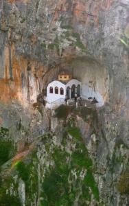a church built into the side of a mountain at Casa Kallisti in Livadeia
