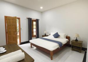 Postel nebo postele na pokoji v ubytování Boeung Kirirum Lumhae Resort