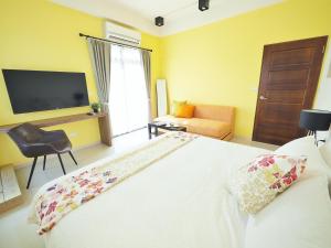 מיטה או מיטות בחדר ב-Season 5 Country Inn