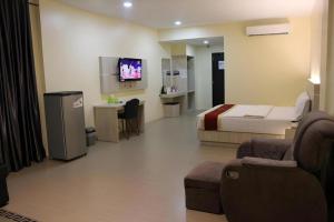 Televiisor ja/või meelelahutuskeskus majutusasutuses Balai View Hotel