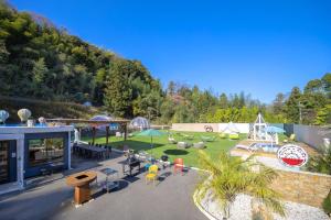 an aerial view of a park with a playground at Dream Dome Glamping Studio Ichihara in Ichihara +93 photos