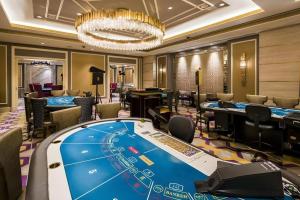 a casino with a poker table in a casino at Walkerhill Douglas House (Adults Only) in Seoul