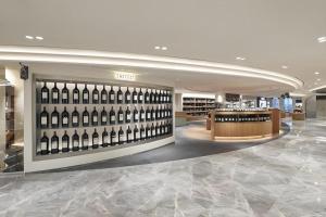 a wine store with a display of wine bottles at Walkerhill Douglas House (Adults Only) in Seoul
