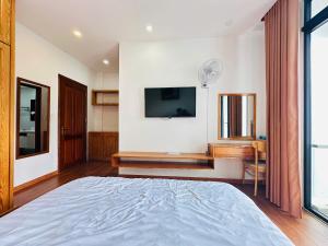 TV a/nebo společenská místnost v ubytování MIM Homestay