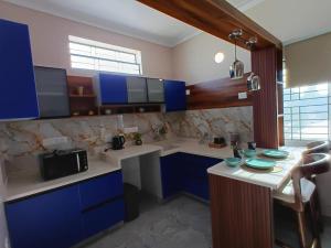 Η κουζίνα ή μικρή κουζίνα στο Villa Vista