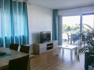 TV a/nebo společenská místnost v ubytování La Siesta Apartamentos