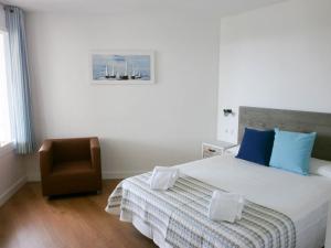 Postel nebo postele na pokoji v ubytování La Siesta Apartamentos + 19 fotografií
