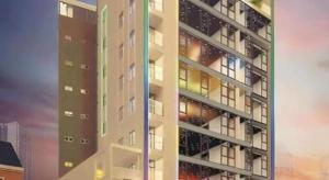 a tall building with colorful windows in a city at Lakeside Hotel Nam Dinh in Vạn Thệp