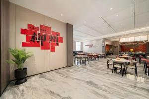 Restaurant ou autre lieu de restauration dans l'établissement Echeng Hotel Liuzhou Central Plaza Pedestrian Street