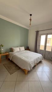 Postel nebo postele na pokoji v ubytování lumière de sud