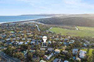 an aerial view of a town with a hot air balloon at Idyllic Aireys Retreat - where ocean & hills meet in Aireys Inlet