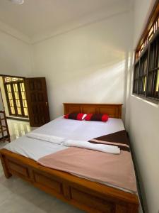 Postel nebo postele na pokoji v ubytování Diyaluma Villa Resort