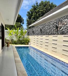 an image of a swimming pool in a house at Villa Kelle - Uluwatu Nusa Dua in Nusa Dua