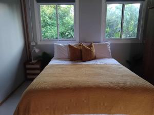 Ένα ή περισσότερα κρεβάτια σε δωμάτιο στο Pradu House Koh Yao Noi +13 φωτογραφίες