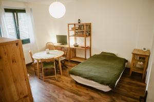 Ένα ή περισσότερα κρεβάτια σε δωμάτιο στο Bolgárkert Family House